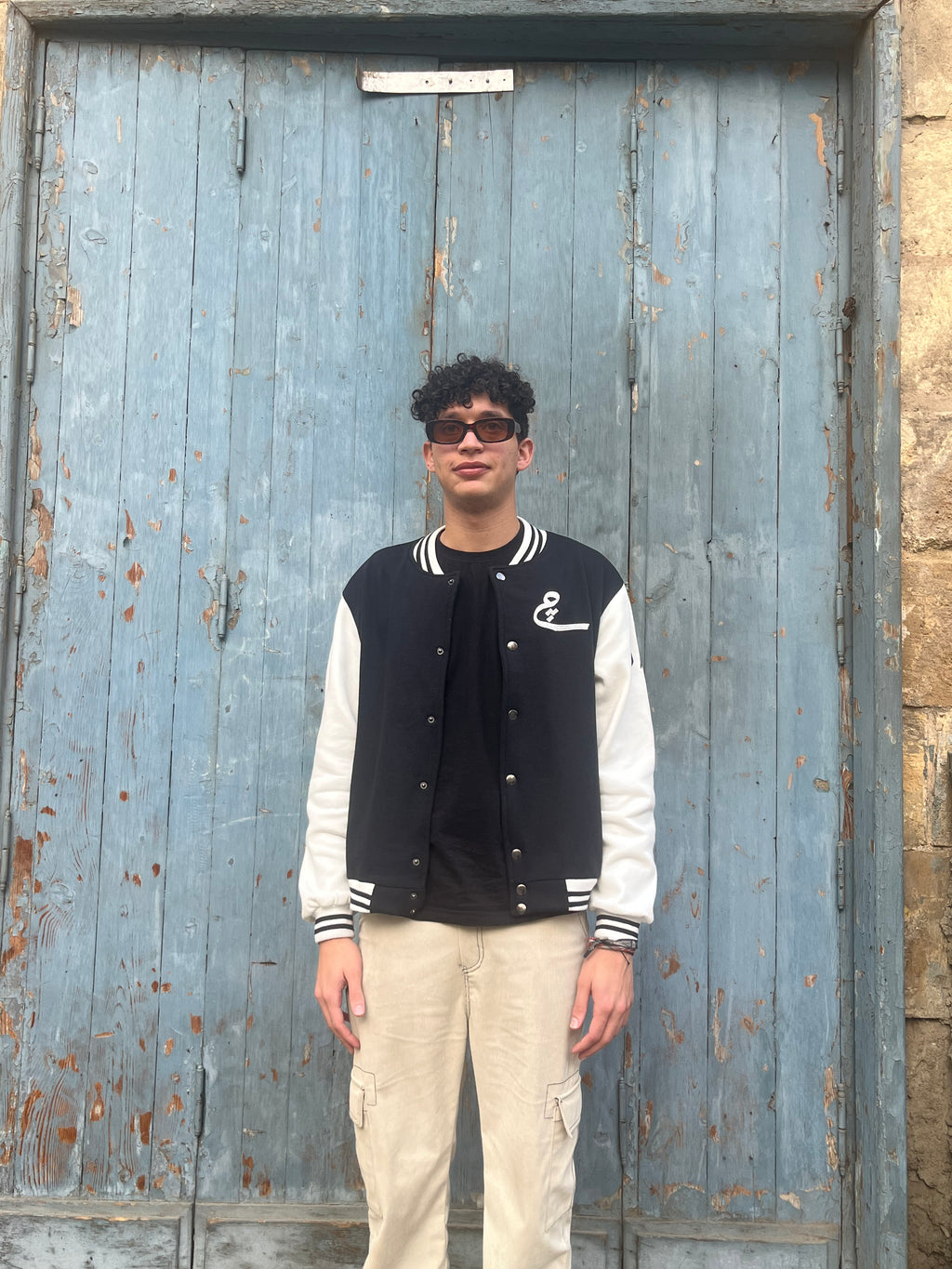 The "چ" Varsity Jacket (Black)