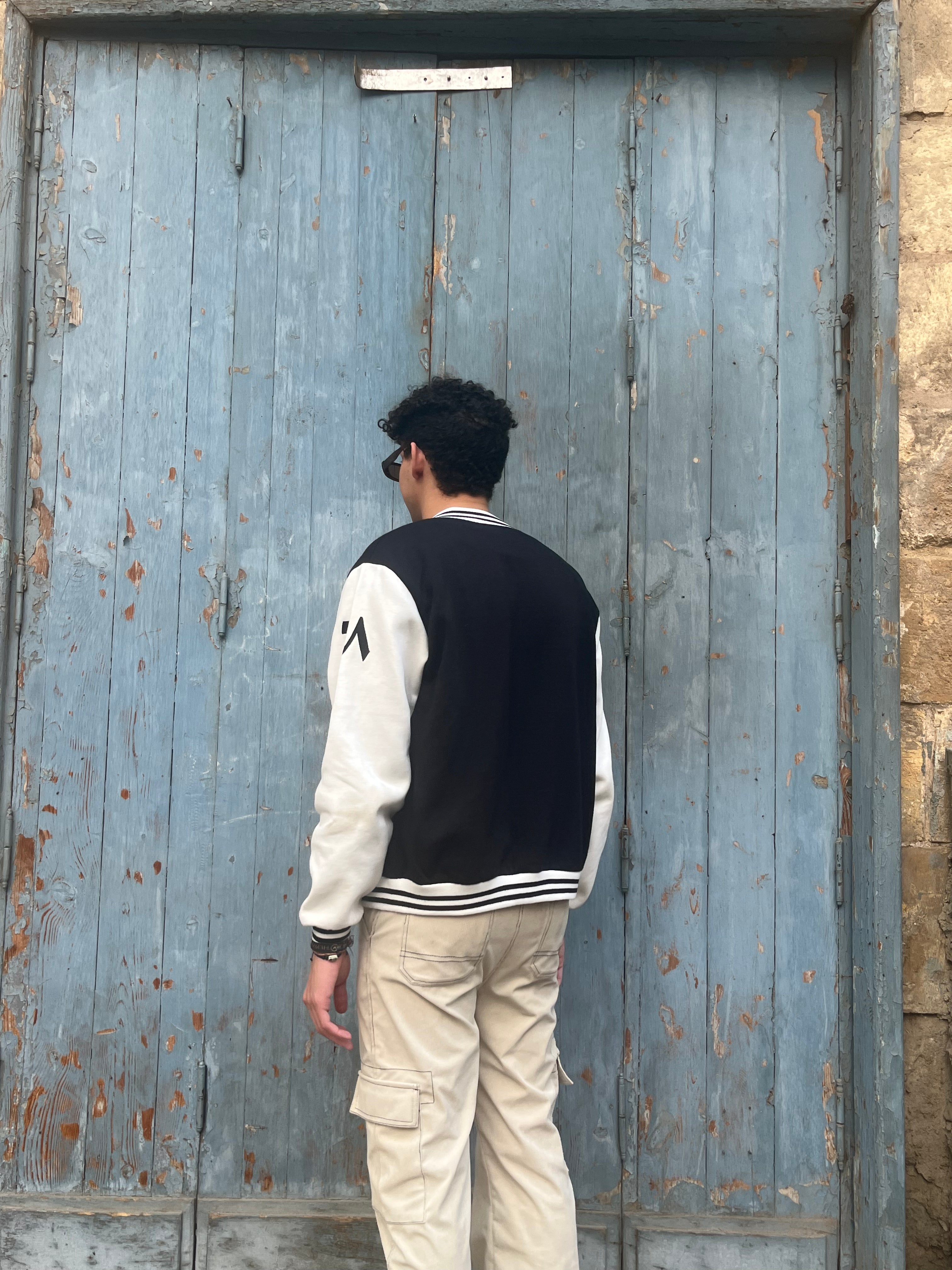 The "چ" Varsity Jacket (Black)